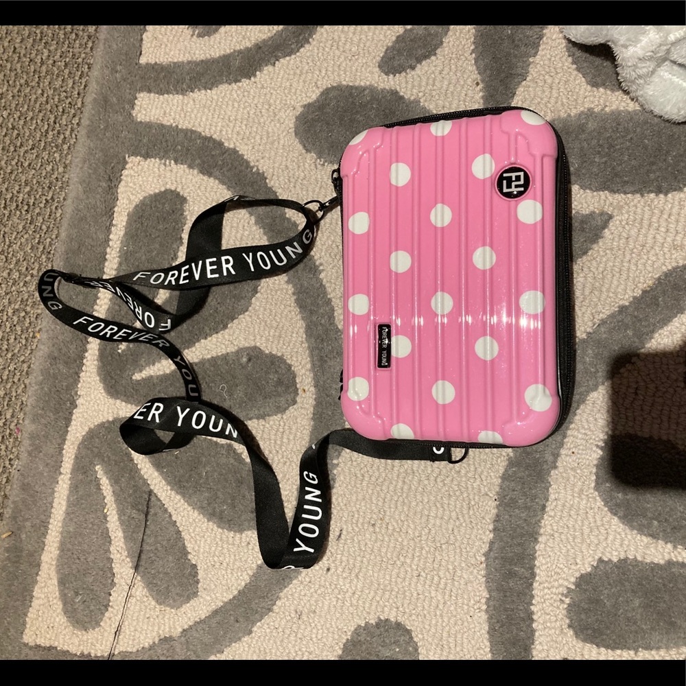 Pink and white polka dot purse